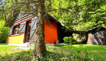SUR LES HAUTEURS DU MENIL VUE EXCEPTIONNEL POUR CE  CHALET COUP DE COEUR