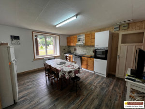 2 chambres 65 m² en rez de jardin. Cave, garage et terrain privatif