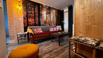 2 chambres 65 m² en rez de jardin. Cave, garage et terrain privatif