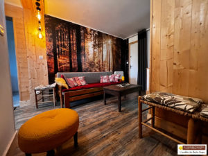 2 chambres 65 m² en rez de jardin. Cave, garage et terrain privatif